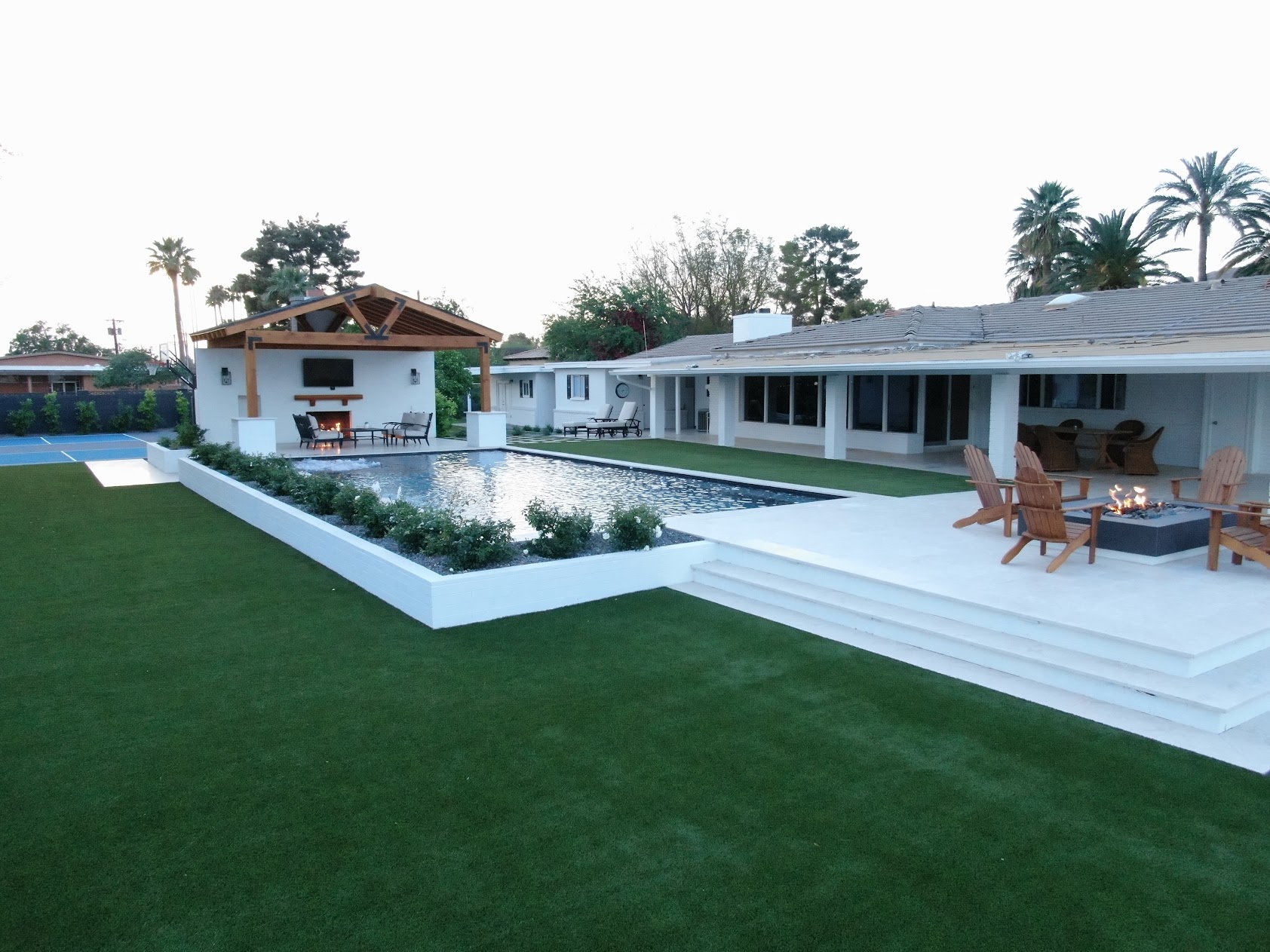 High-end Scottsdale estate remodel with ramada, fire pit lounge, and full backyard design